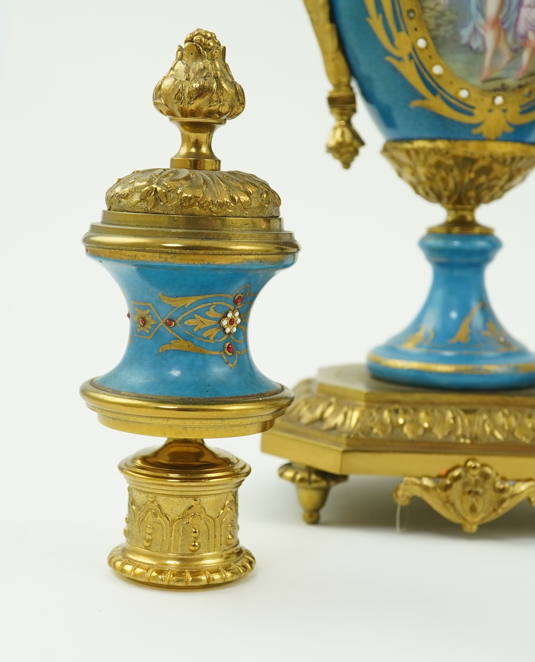 A pair of late 19th century ormolu mounted Sevres style porcelain cassolettes